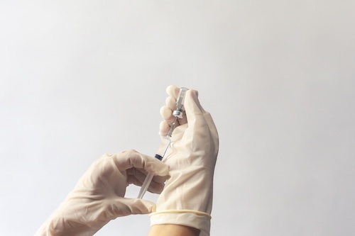 Woman receiving vaccination as a preventive step against cervical cancer